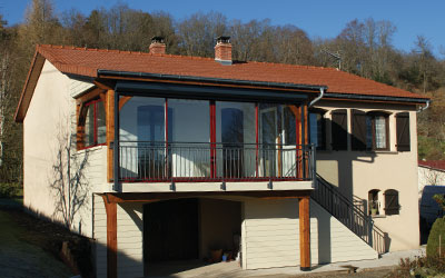 modification d une terrasse en veranda avec grandes baies vitrees